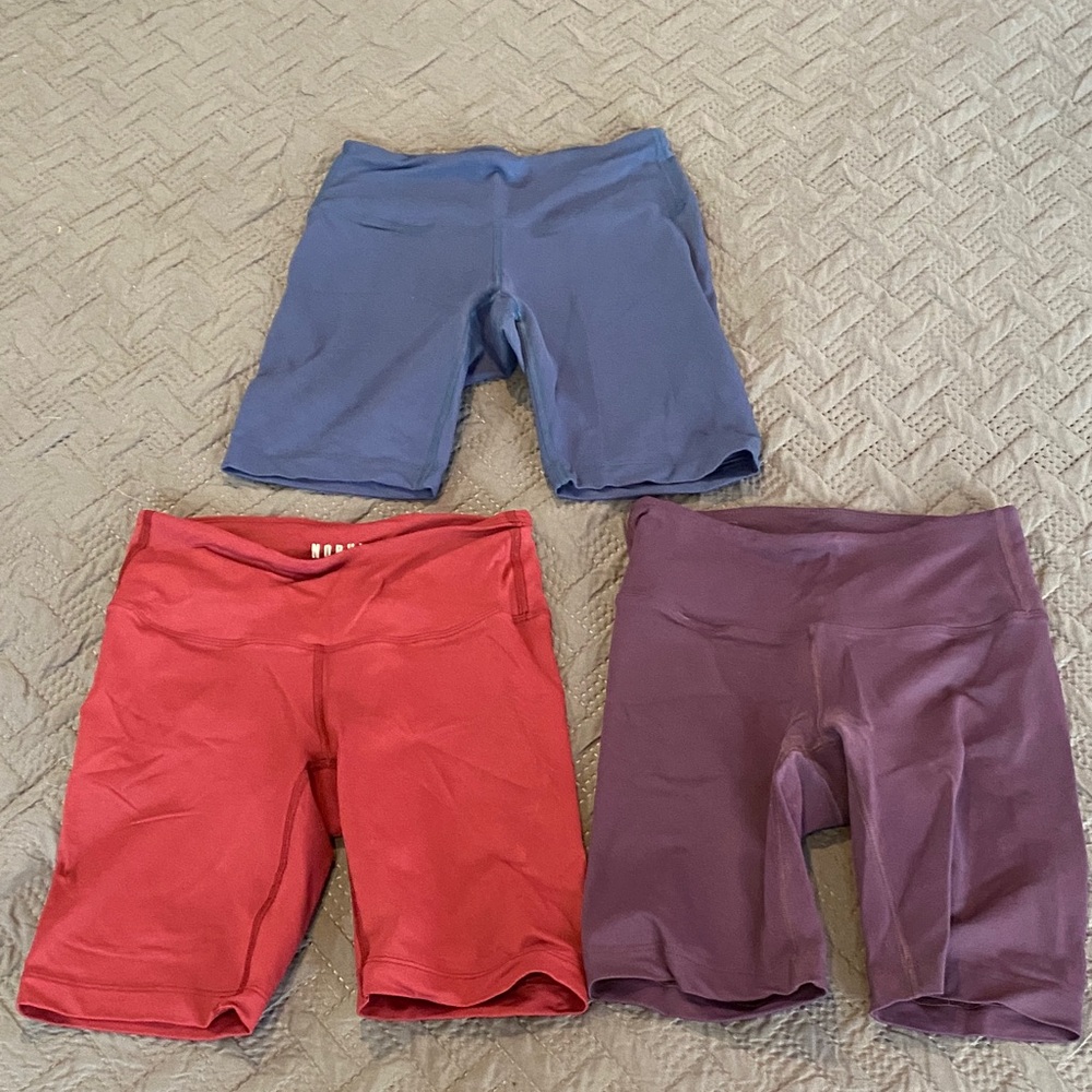 Bundle of NOBULL Biker Shorts in Red, Blue, and Purple